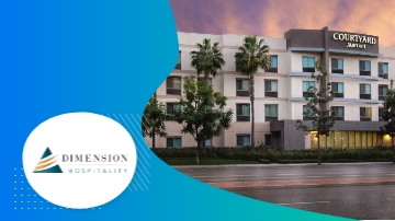 Courtyard hotel building with trees and a road, featuring the Dimension Hospitality logo.