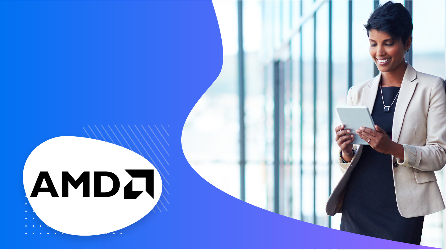 A woman stands holding a tablet with an AMD logo in front of a building.