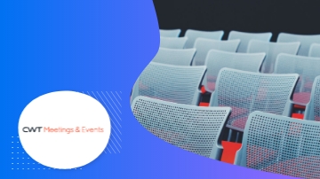 CWT Meetings & Events in a conference hall with chairs and a blue background.