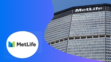 Metlife building with the logo in front on a blue background.