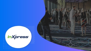 A group of people are standing inside the room, with the InXpress logo in the bottom left corner.