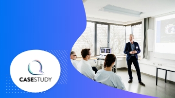 A man is giving a presentation about sustainability in a conference room.