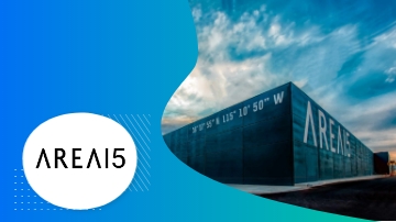 Area15 building with blue sky and clouds in the background.