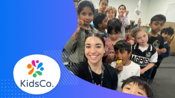 A group of kids in a classroom with the logo of KidsCo on the left side.