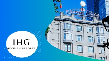 The IHG Hotels & Resorts logo with the Crowne Plaza Hotel in the background.