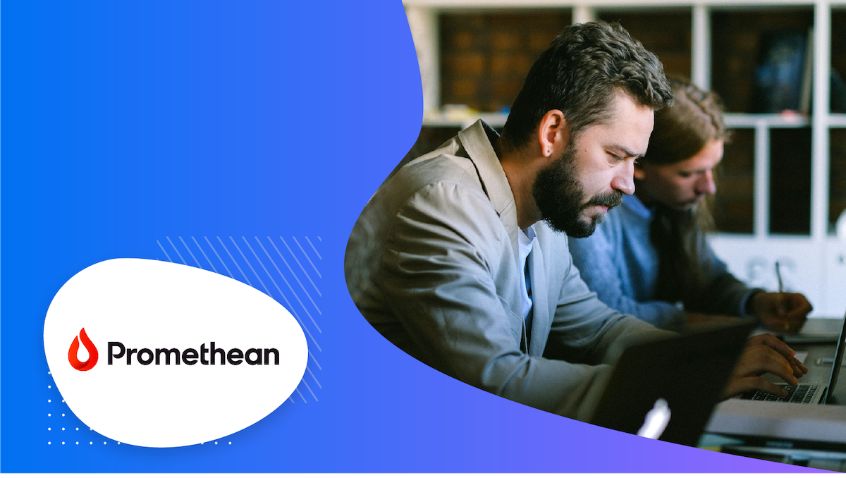 Two people working on their laptops with the Promethean logo in the bottom left corner.