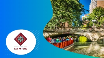A bridge, boat, water, and the text "VISIT SAN ANTONIO" on a blue and white background.