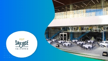 An outdoor dining area with glass walls and the text "Visit San Jose, California" on a blue background.