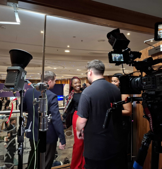 Production filming team onsite at an event