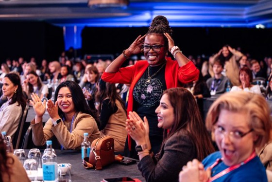 Woman in red among audience
