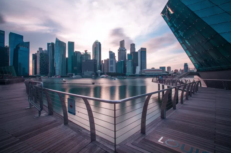 Louis Promenade with Marina Bay Sands in the background at sunset in Singapore.