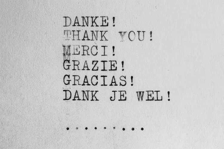 A thank you note with text in multiple languages, including German, English, French, Italian, Spanish, and Dutch.