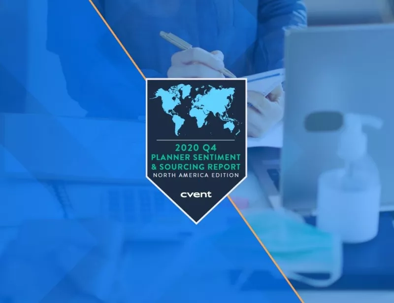 A person writing in the background, with a blue world map on a black background in the foreground.