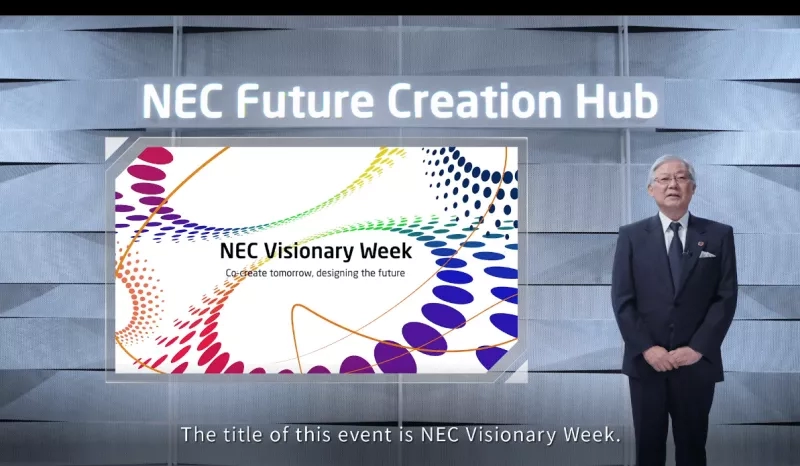 NEC Visionary Week, text, and an old man standing beside a wall with an architectural design.