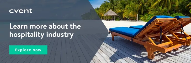 Wooden sun loungers on a beach with text about the hospitality industry.