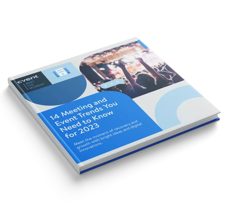 A book titled "14 Meeting and Event Trends You Need to Know for 2023" on a table.