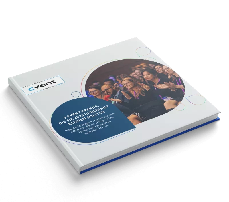 A book titled "9 Event-Trends, die Sie 2023 unbedingt kennen sollten" is placed on a black surface.