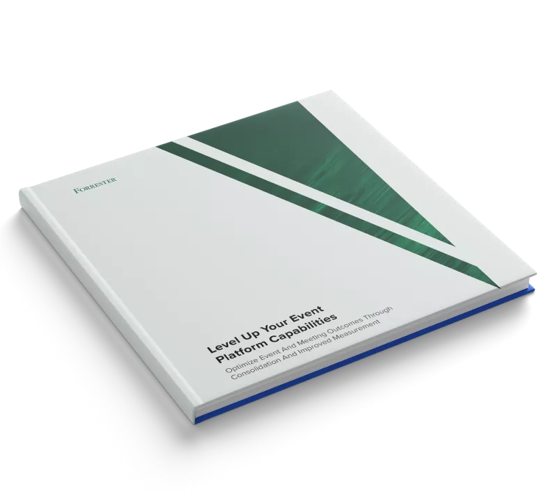 A white booklet with the title "Level Up Your Event Platform Capabilities" placed on a black surface.