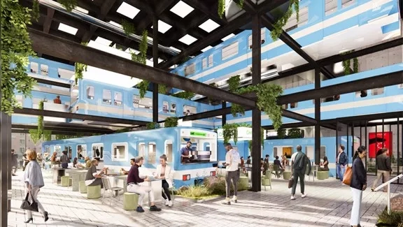 Rendering of outdoor seating in front of a blue building with people walking around.