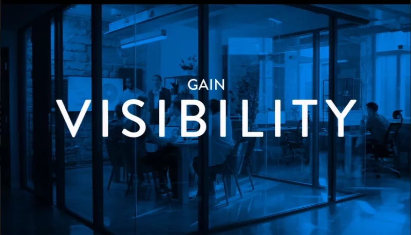 People working in an office with the text Gain Visibility over the image.