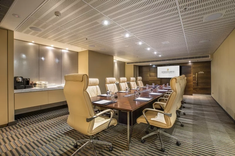 A meeting room at the Intercontinental views of the Black Sea with a long table and chairs.