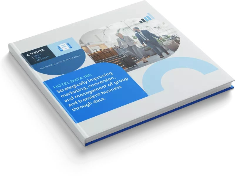 Hotel data 101 book by Cvent showcasing a couple with luggage in a hotel lobby.