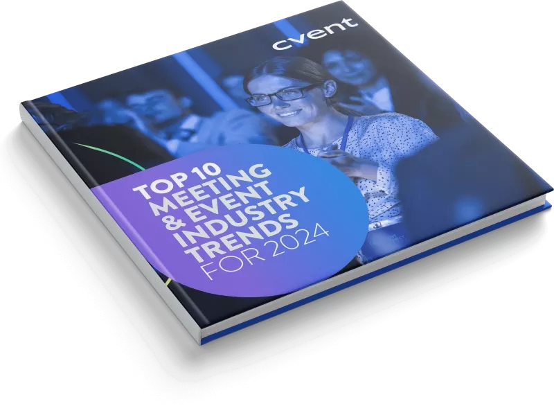 The book cover of Cvent's top 10 meeting and event industry trends for 2024 features a woman smiling.