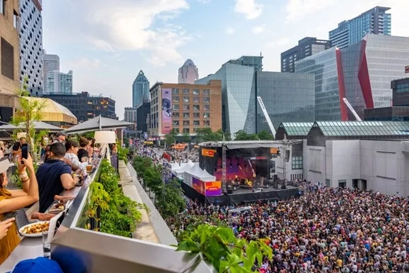 Crowd at the rooftop of Art Gallery of Ontario during a summer event, Toronto, Canada.