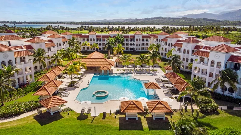 Aerial view of the Hyatt Regency Grand Reserve in Puerto Rico with resort architecture and landscaping.