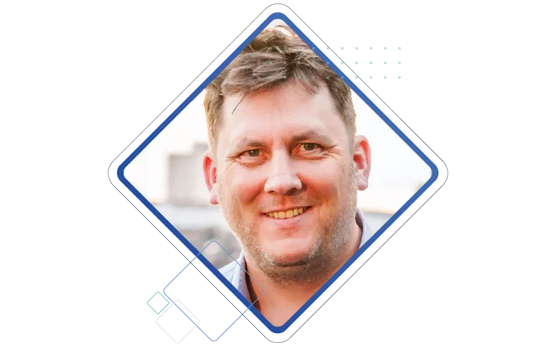 A man's headshot is placed in decorative element illustration