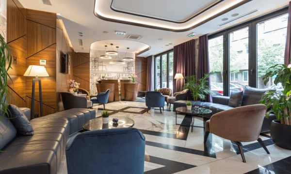 Interior view of empty hotel lobby during shoulder season, a prime time for renovation projects.