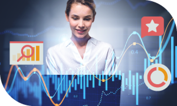 A smiling woman is standing in front of a laptop with different charts and graphs on the screen.