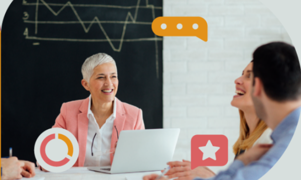 Four people in a meeting, with a laptop, icons of a star, chat, and clock on the image.
