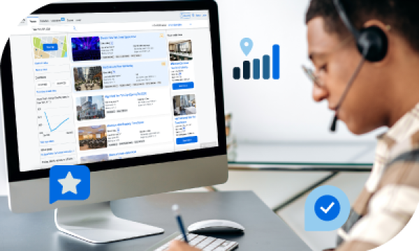 Woman wearing headset working on a computer with a travel booking website open on the screen.