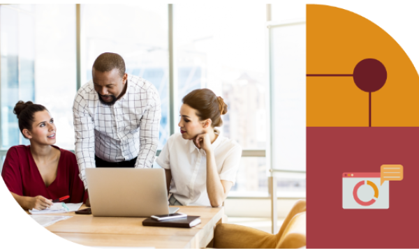 Two women and a man sit at a desk working on a laptop, with a red banner in the background.