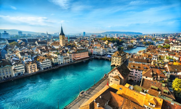 Zurich, Switzerland, with cityscape, river, and architecture, showcasing urban beauty and European charm.