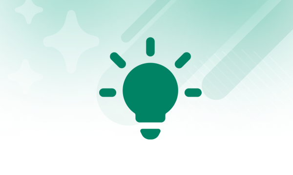 Lightbulb on green artistic background