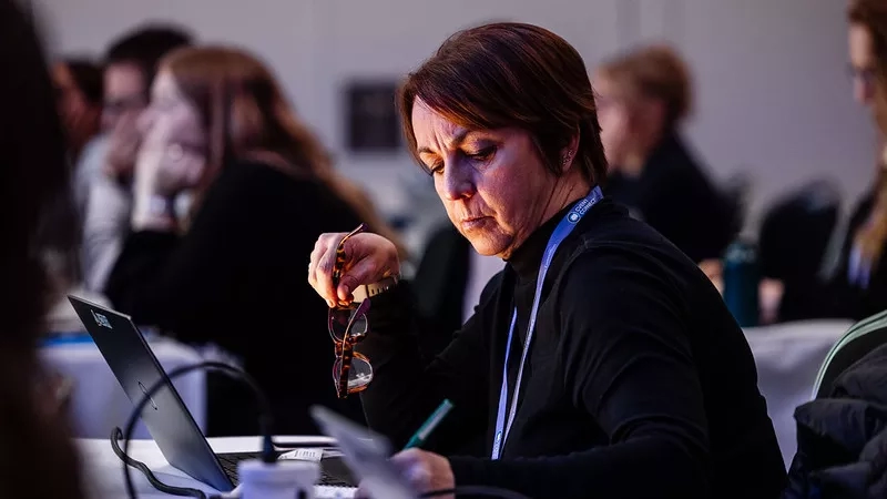 Woman at a conference