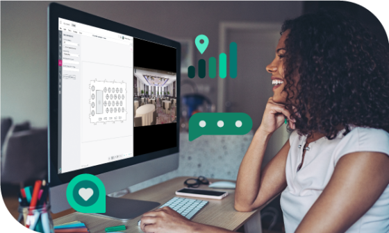 A woman working on a laptop with icons for location, chat, and heart on the side.