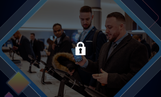 Man showing his phone to another man, with a lock icon overlay in the center of the image.