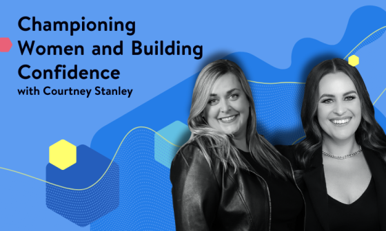 Two women stand in front of a blue background with text that reads "Championing Women and Building Confidence with Courtney Stanley."