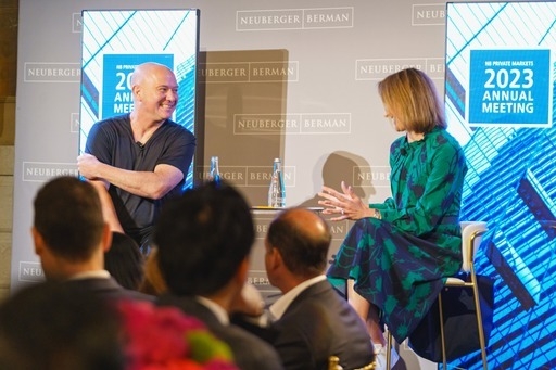 Speakers sit on stage at the 2023 Neuberger Berman Annual Meeting.