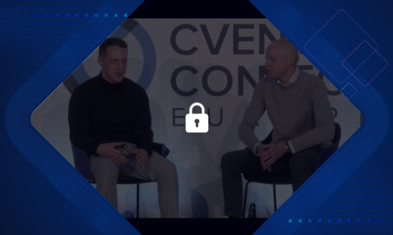 Two men sitting next to each other with a lock in the center and CVECon written in the background.