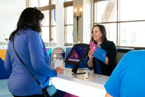 Cvent OnArrival at Alkami Co:lab with attendee checking in for conference