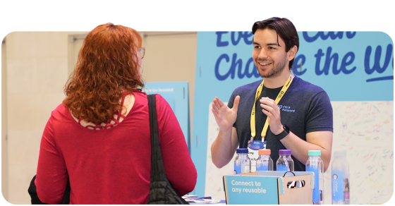 Cvent CONNECT sponsor talking to an attendee