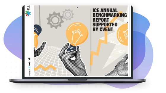 A laptop displaying the "ICE Annual Benchmarking Report" cover, featuring a hand holding a lightbulb and gears in the background.