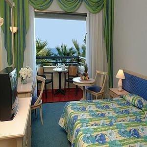 The Palm Beach Hotel & Bungalows в Larnaca, CY
