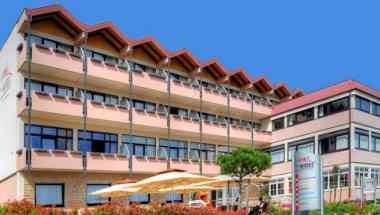 Hotel Haus am Weinberg в Sankt Martin, DE