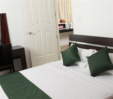 Asset Summit Suites em Kochi, IN