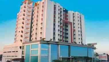 Asset Summit Suites em Kochi, IN